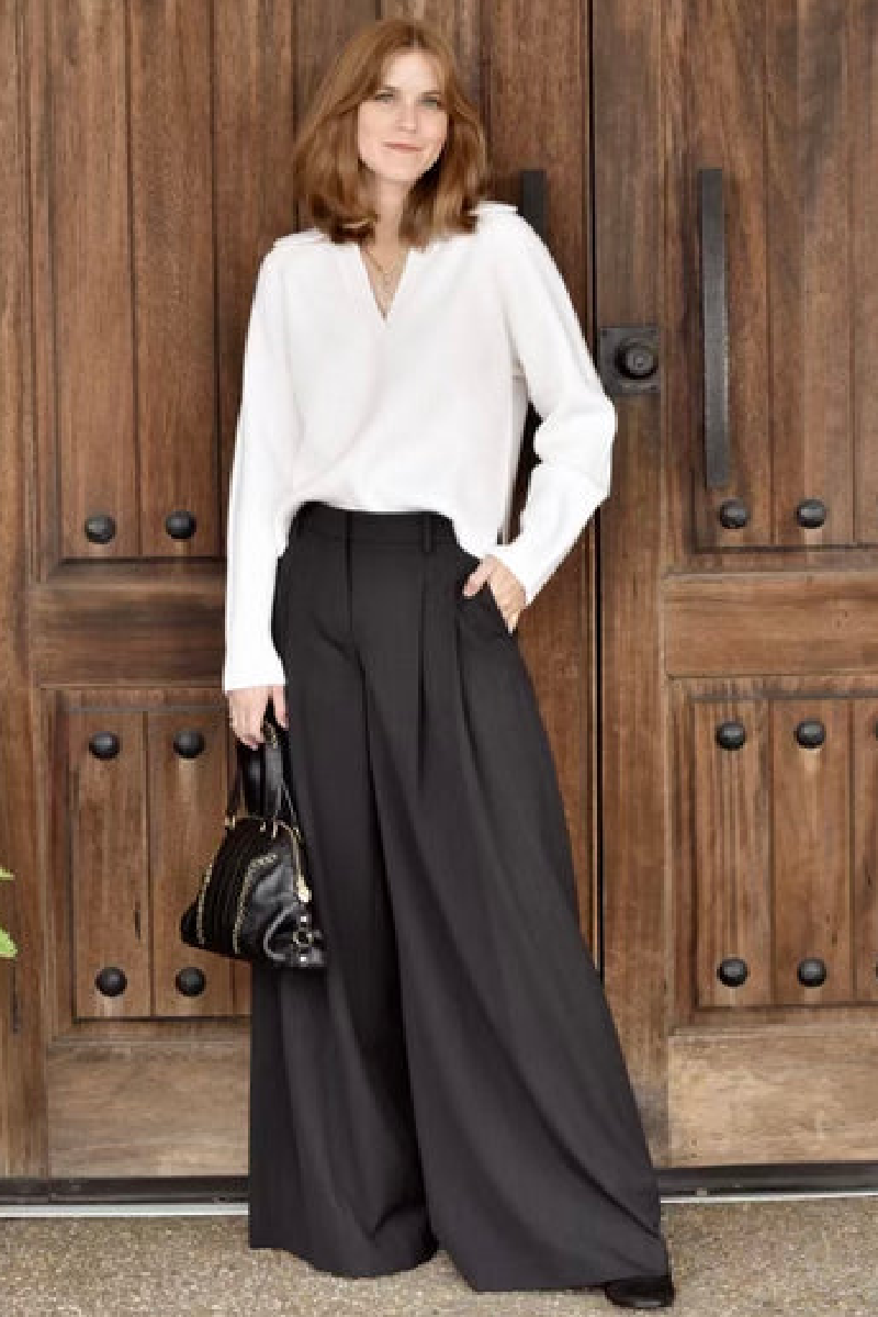 【2plan】Etsi Wool Wide Slacks Lonan virgin wool wide-leg pants in black - The Row | Mytheresa